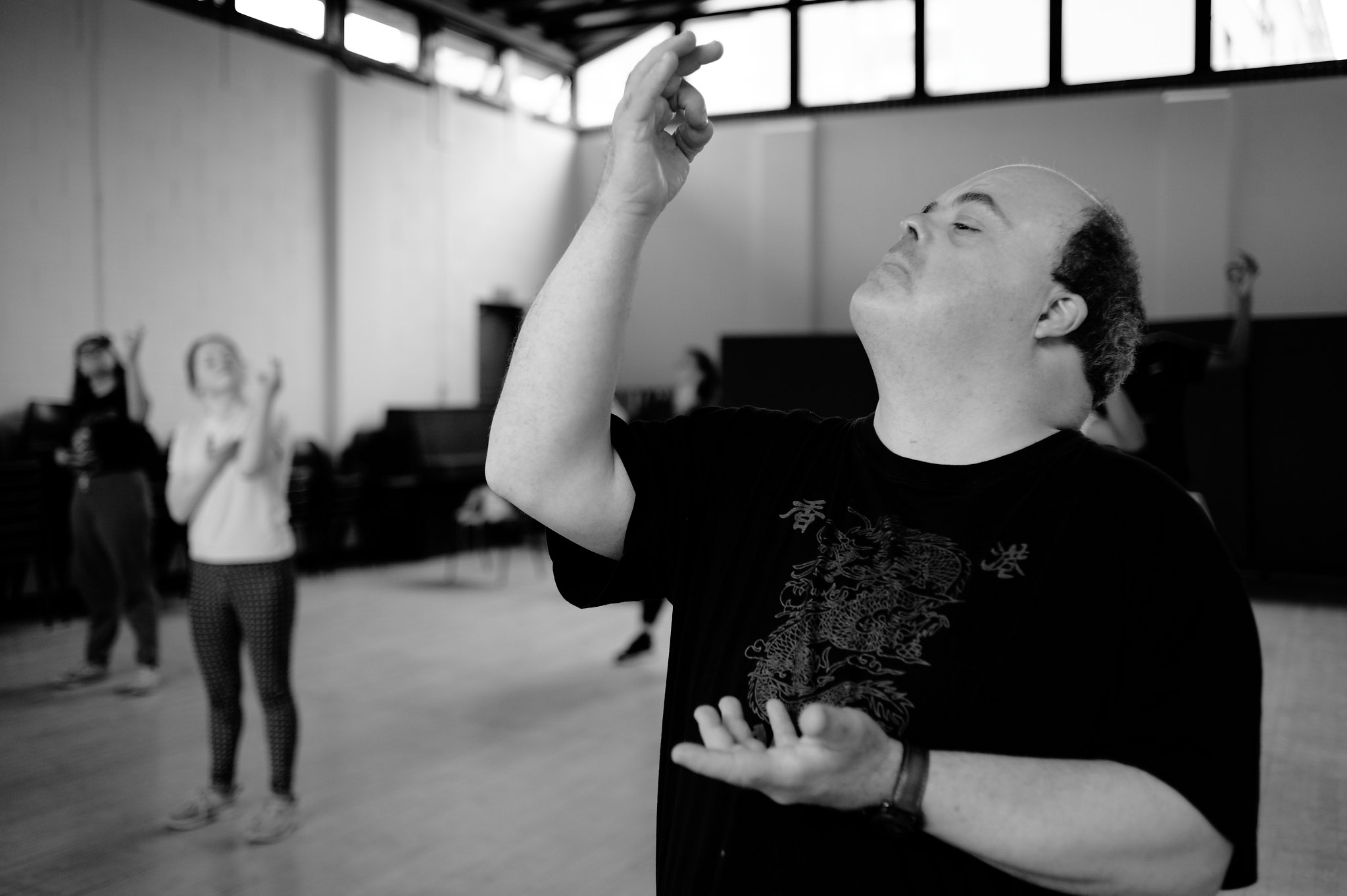 Black and white photo of Graham dancing at the British Museum 
